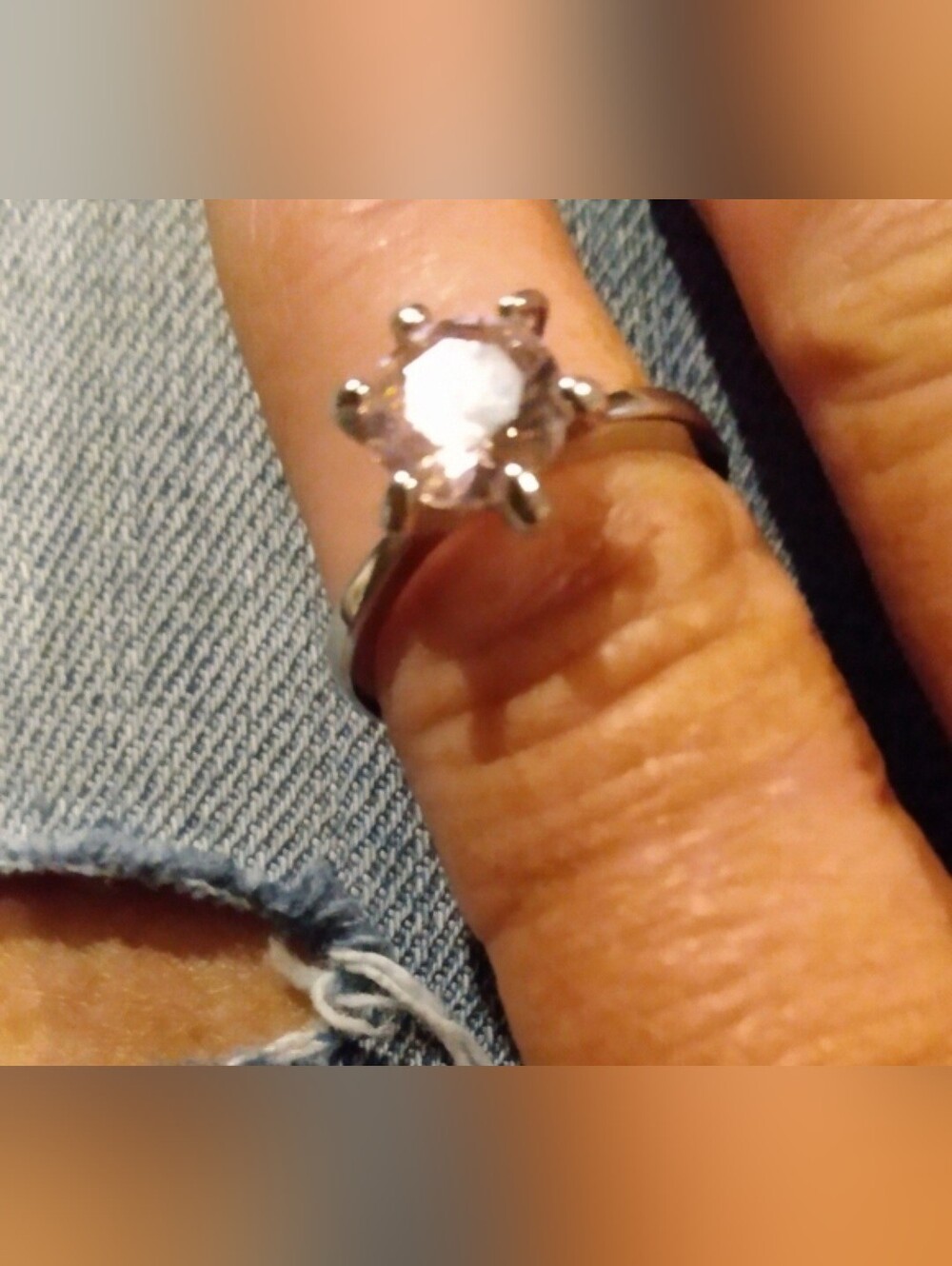 New silver ring with pink faceted solitaire stone